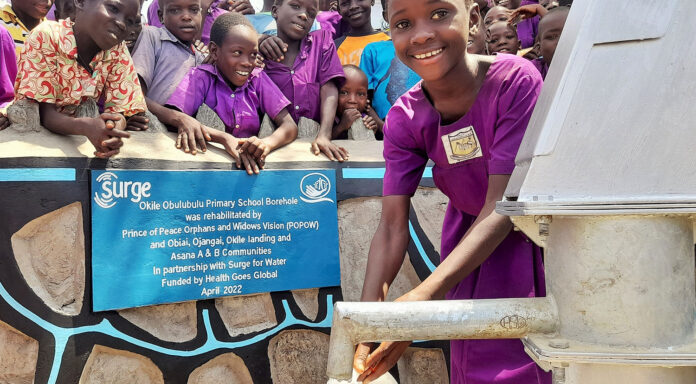 A Joyous Young Girl Fetches Water Okile Obulubulu Primary School Water Source Rehabilitation Completed