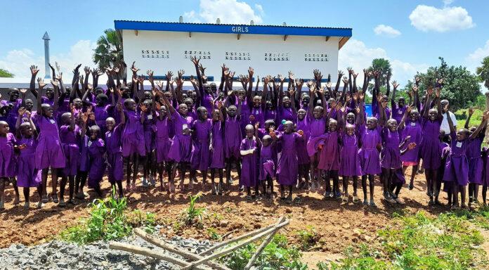 Happy End Users Infront Of Their Latrine Okile Obulubulu Primary School Girls Latrine