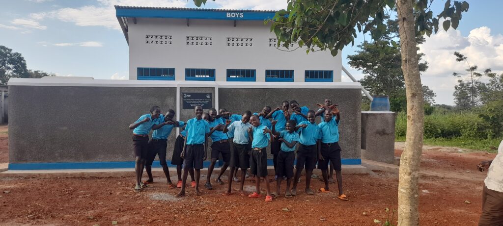 Boys Infront Of The Latrine Block