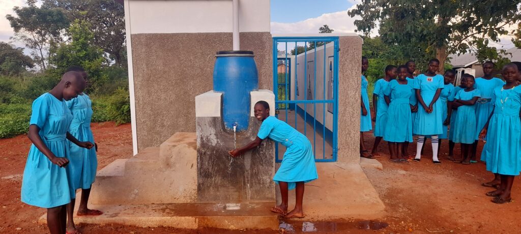 Jubilant Girl Washing Hands