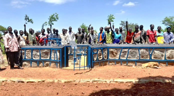 Figure 2 Group Photo Of The Water Users At The Water Source